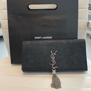 Saint Laurent Cassandre Clutch metallic with tassel